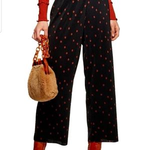 Black and red poka dot pants